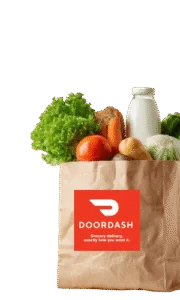Paper grocery bag of fresh produce, bread and milk with the DoorDash logo